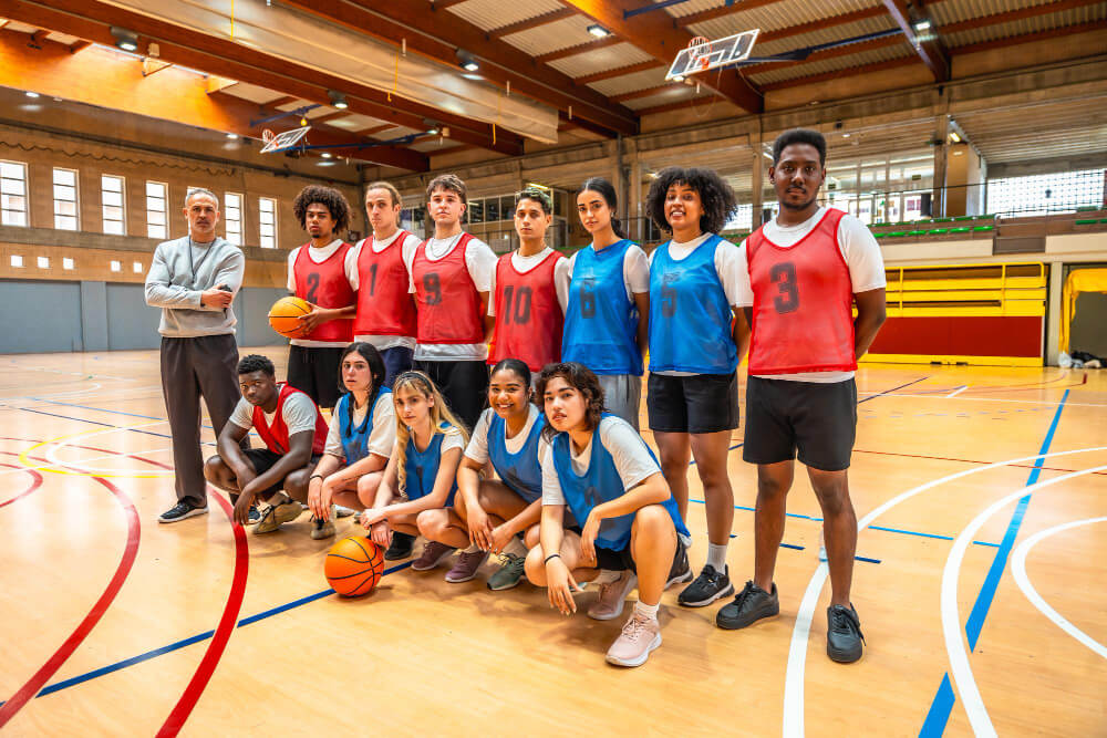 Basketball team posing for a group photo