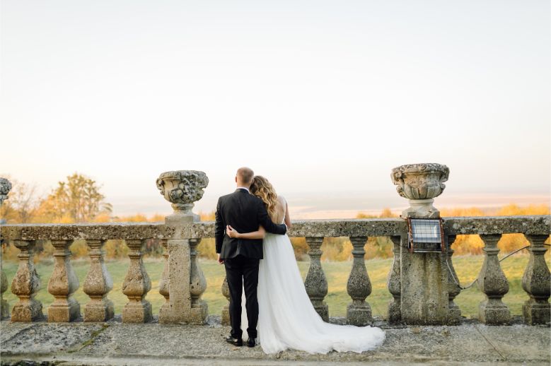 Couple posing together on their wedding day