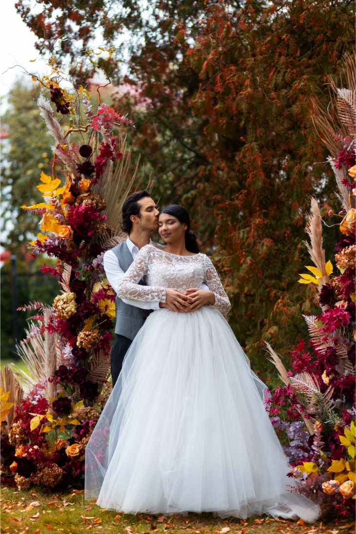 Couple posing at their wedding